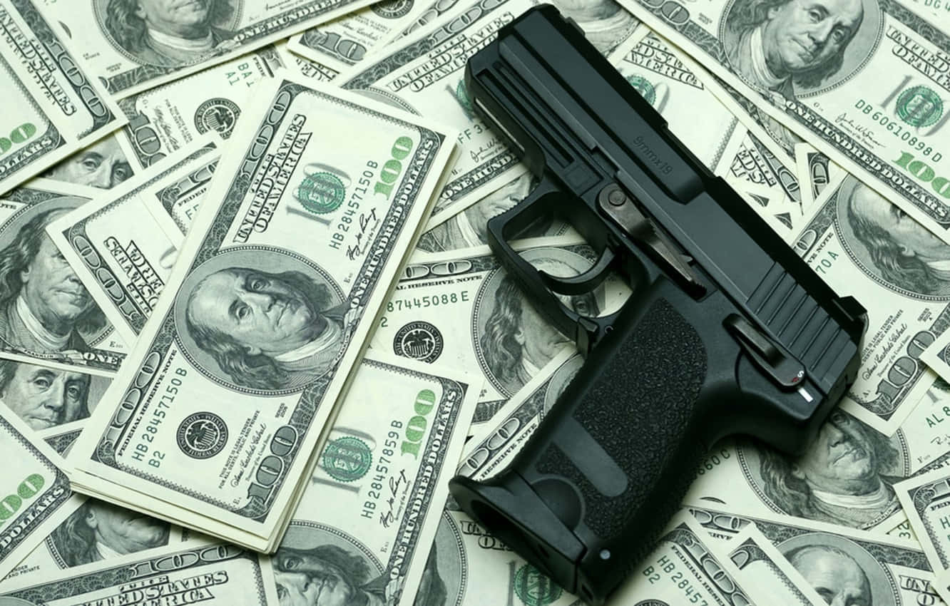 Dollars with a pistol on top representing Pay-for-Slay