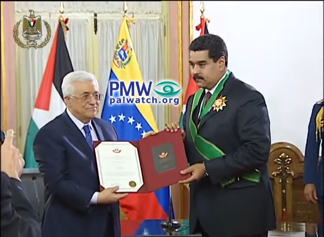 Picture of Abbas giving Star of Palestine medal to Hugo Chavez